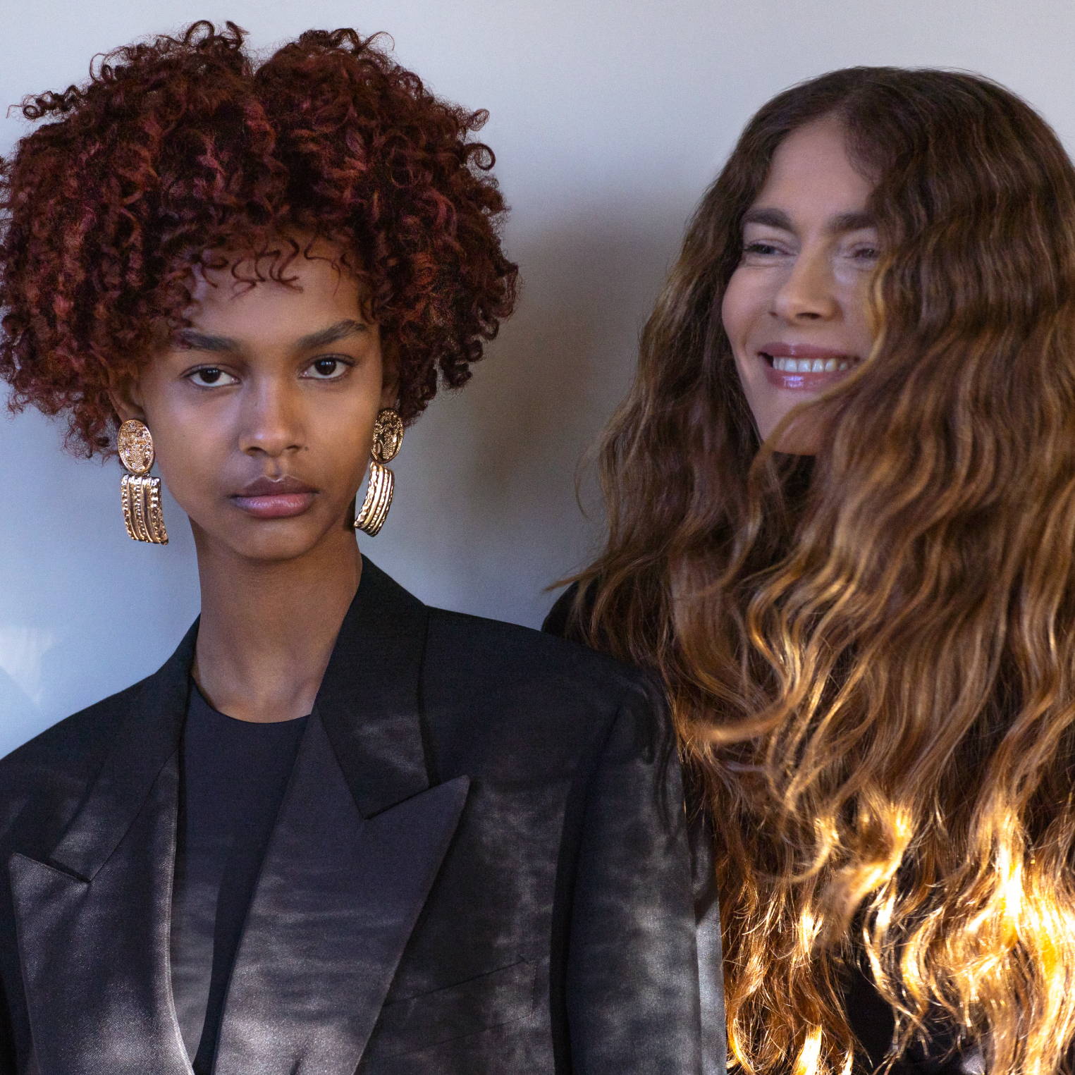 Two Davines hair models posing together