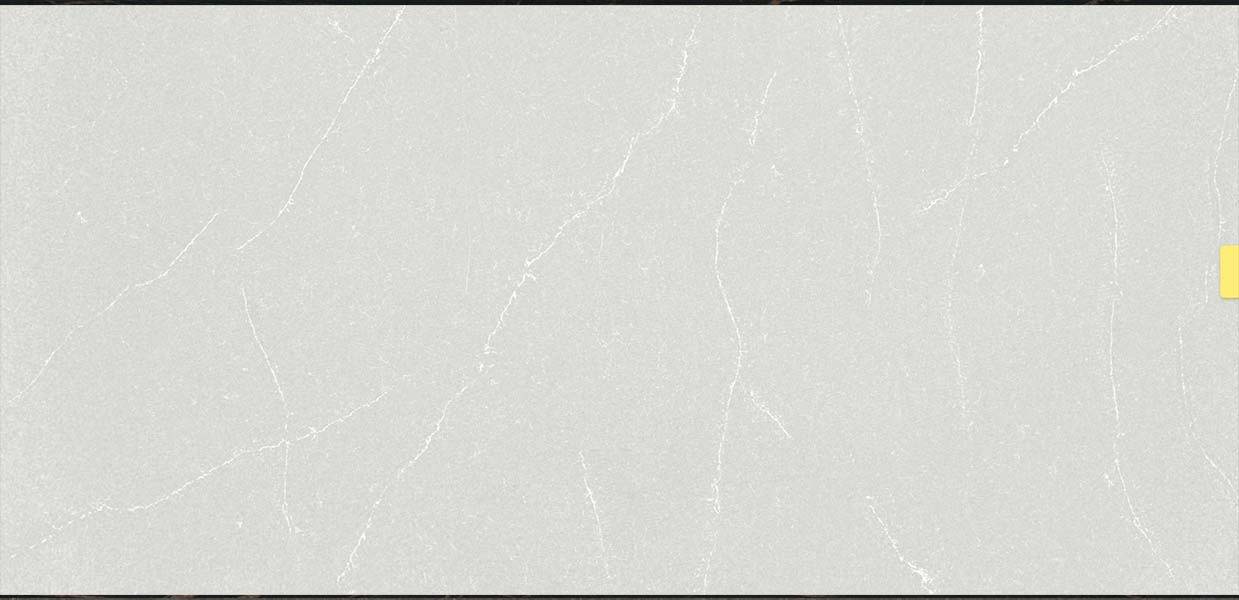 Silestone Desert Silver Muster, hellgraue Oberfläche mit feiner, silbrig-weißer Äderung.