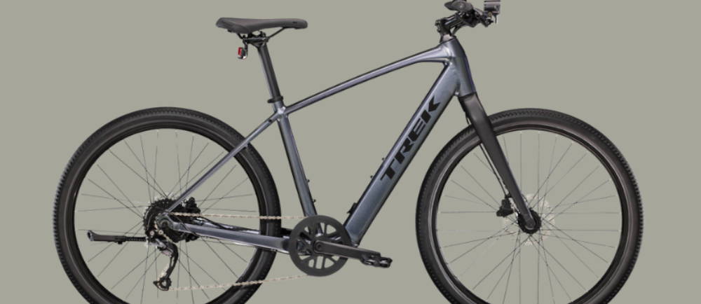 a silver Trek Dual Sport+ 2 electric commuter bike