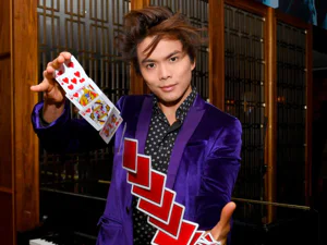 Magician Shin Lim performing with playing cards