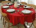 red poly cotton twill tablecloth on a fancy table