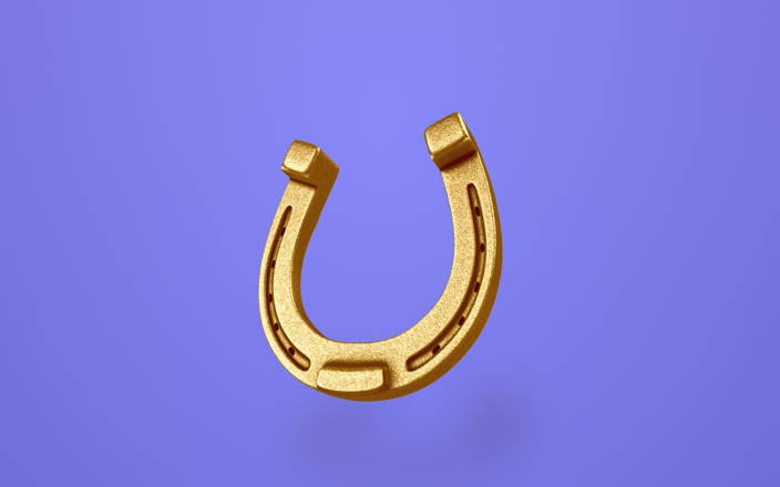 Large gold horseshoe against a purple background (preview)