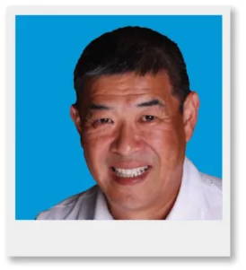 Ed Lowe in blue background photo frame