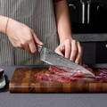 Seido Japanese master chef knife chopping patatoes