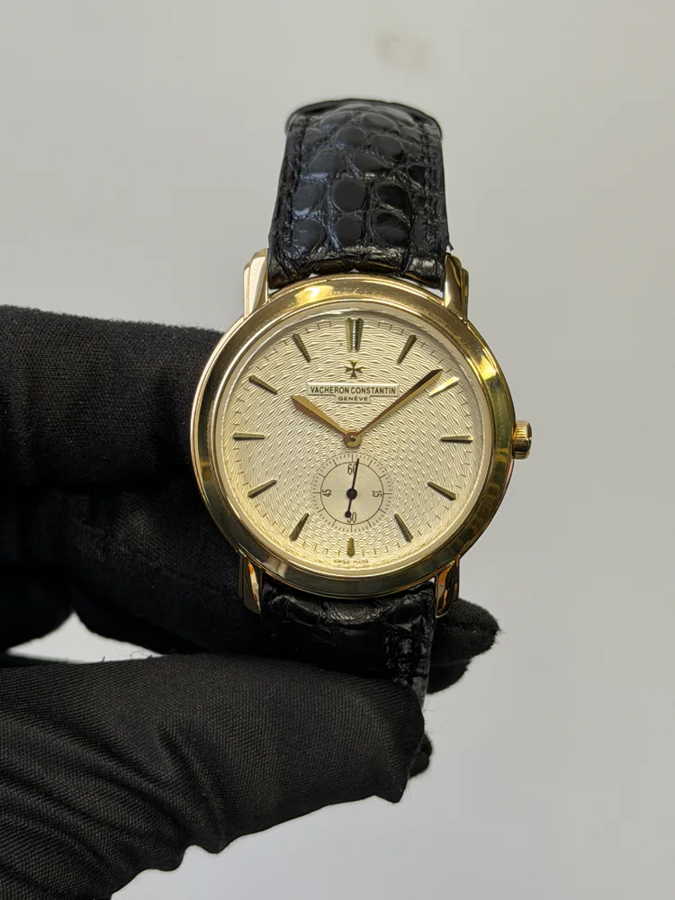 Small seconds 18K Yellow gold