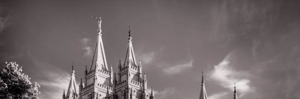 Black and white banner photo of the Salt Lake Temple spires.