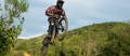 mountain biker on grassy trail