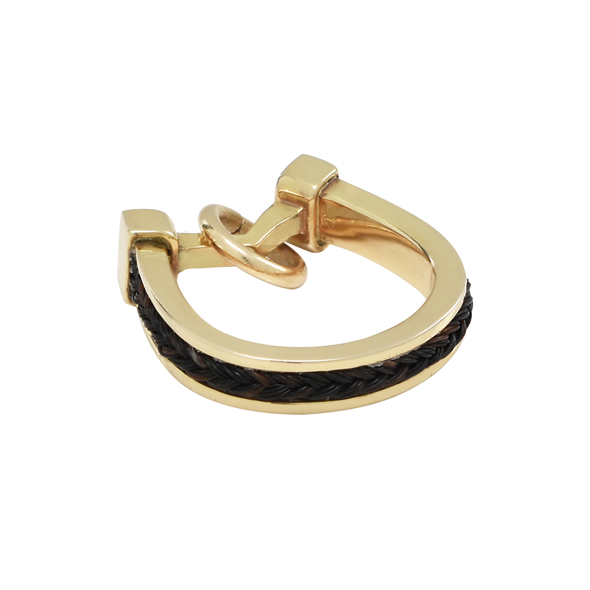 Gold horseshoe charm with horsehair braid inset.