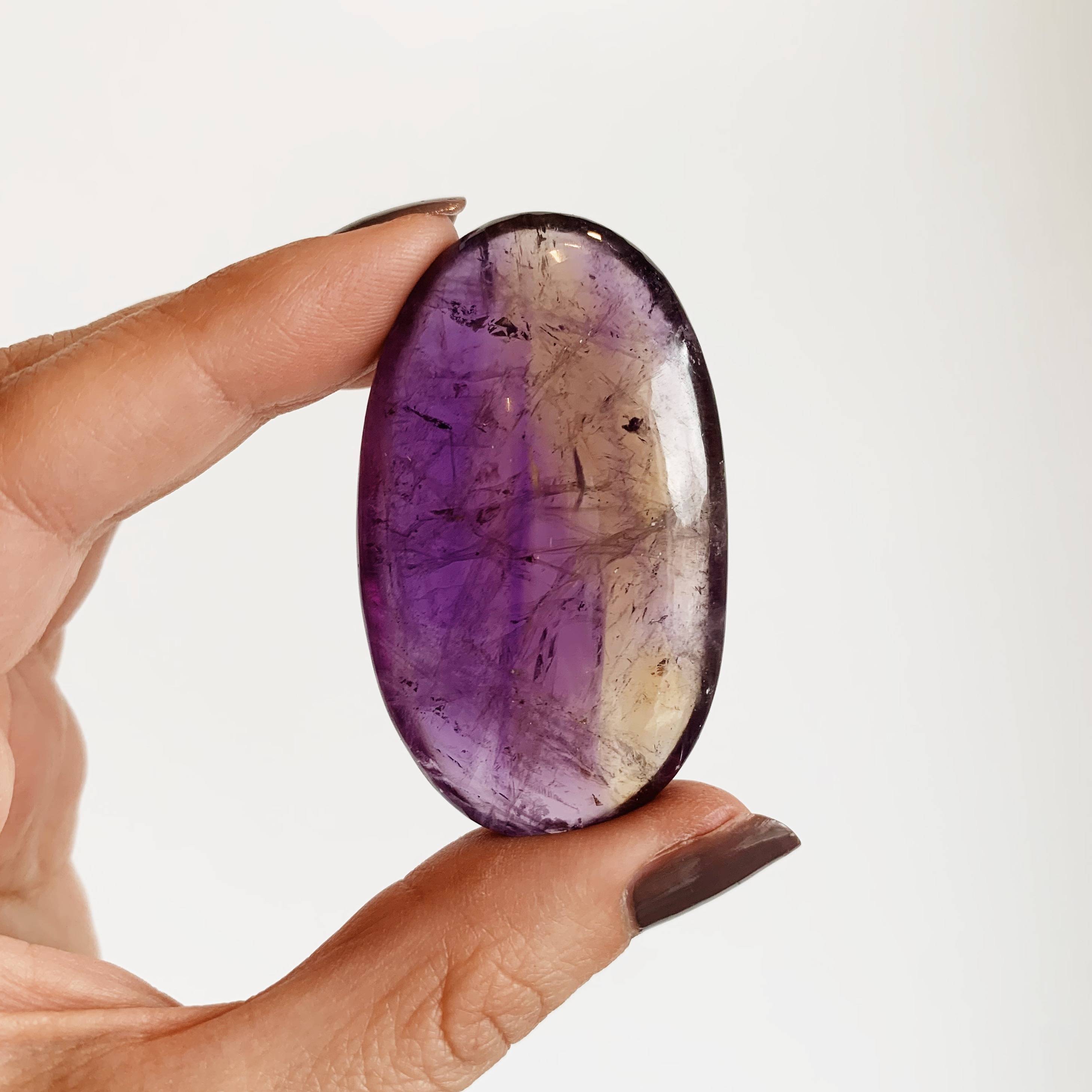 Ametrine Palm Stone a wonderful crystal for Libra
