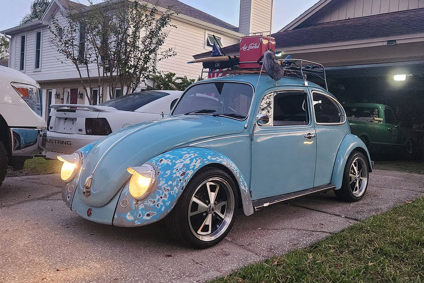 blue volkswagen beetle on black machined klassik rader 914 wheels