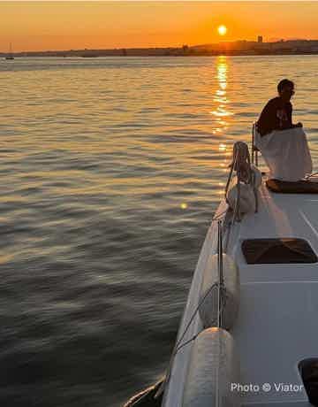 Escape the crowds on land during a sunset sailing tour
