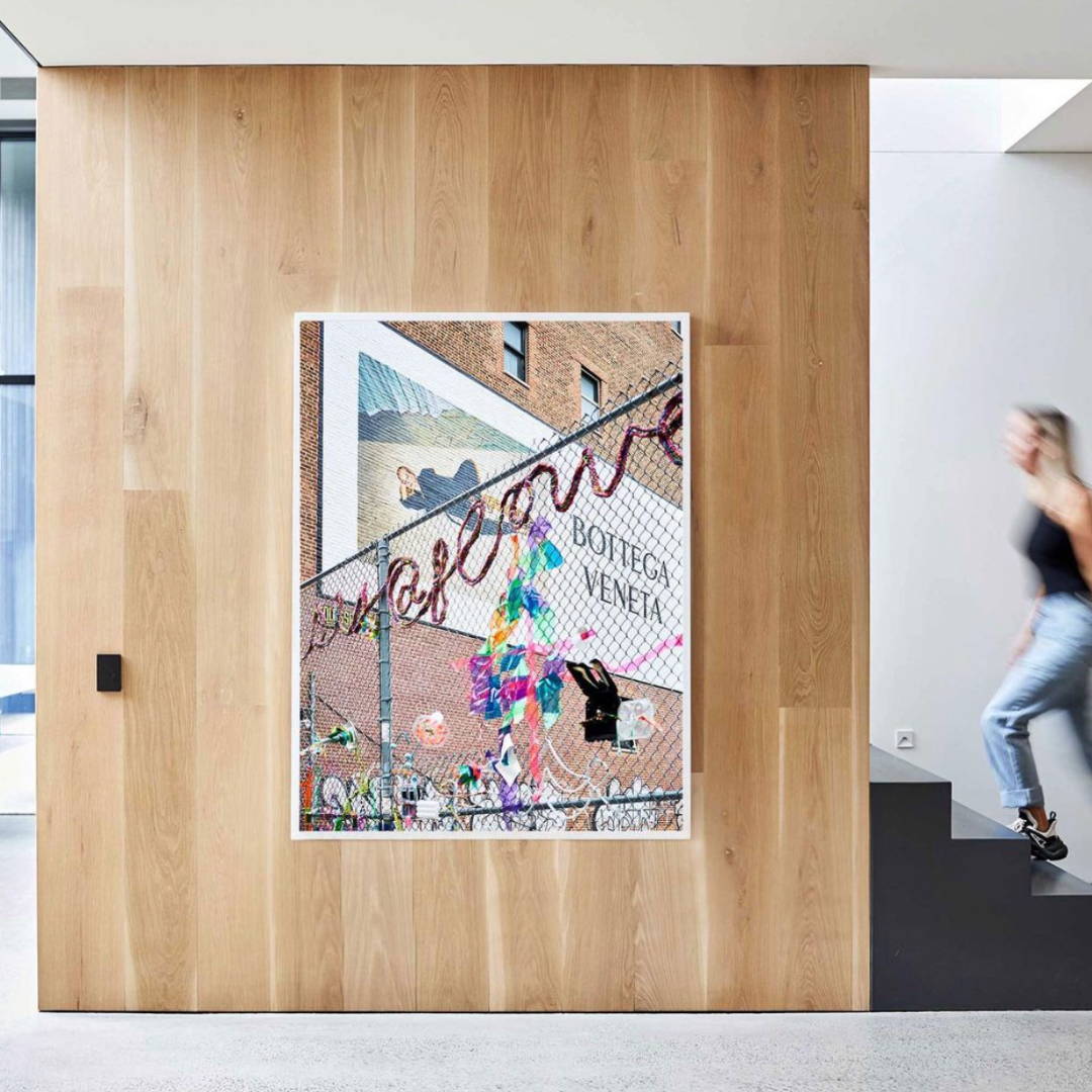 Bottega Venetta by Giclée Studios - A colourful photographic print in pink tones, framed and styled in a modern setting