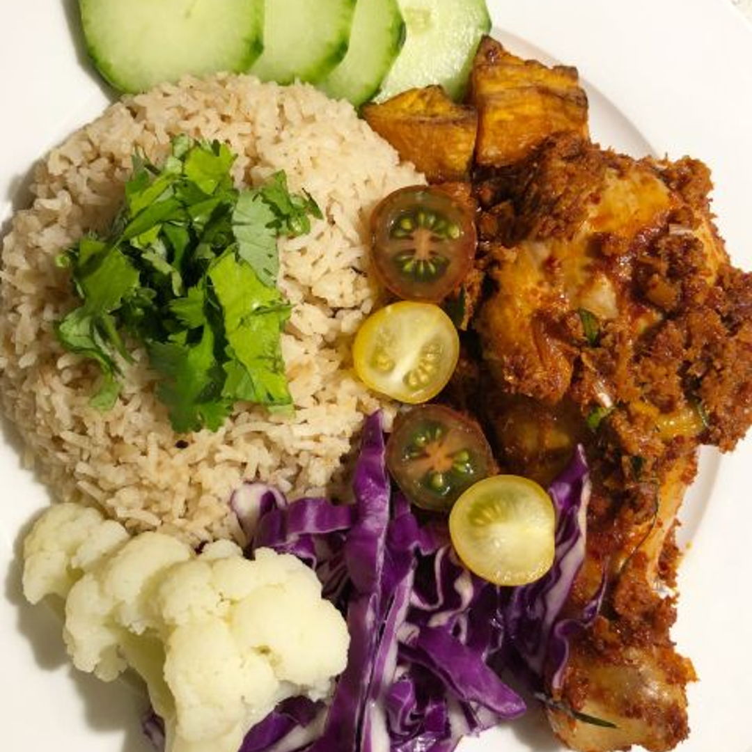 Chicken rendang served with lots of vegetables and rice ????????