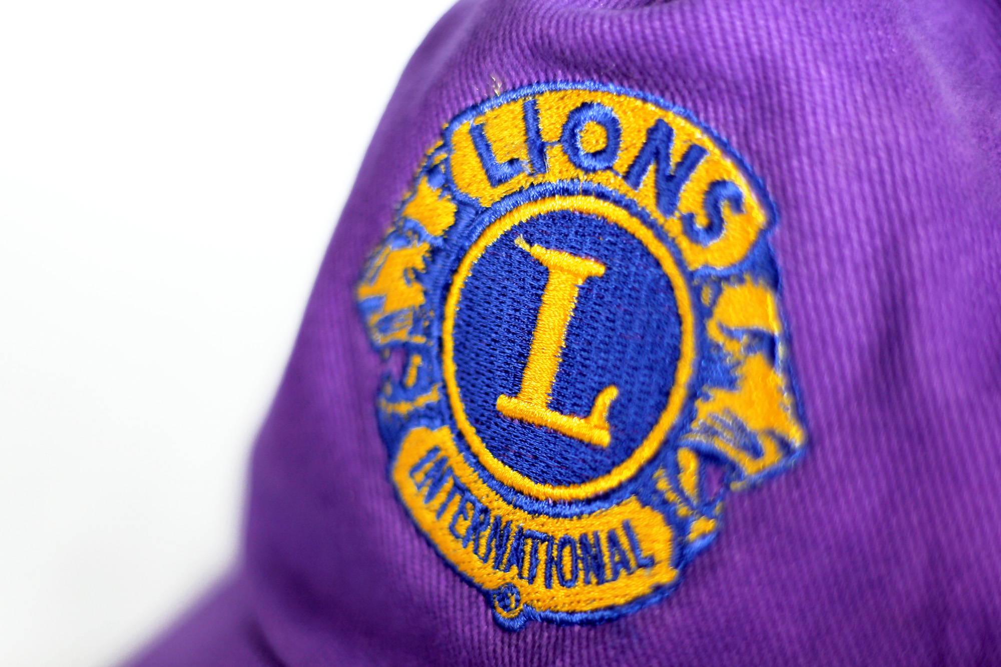 Lions International Digital embroidery printing method on purple brush twill caps SJ Clothing Co Manila Philippines