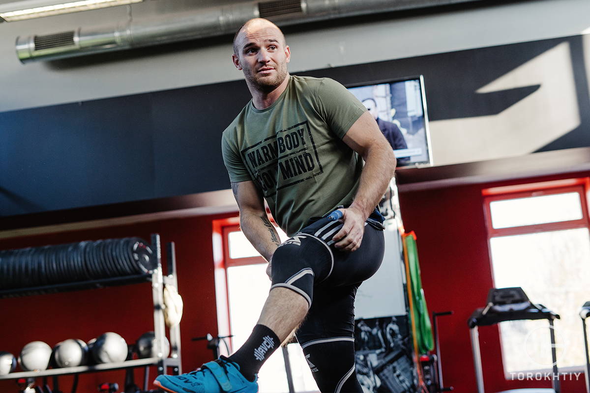 athlete relaxing after lifting at gym WBCM athlete relaxing after lifting at gym WBCM