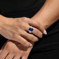 Woman wearing sapphire ring