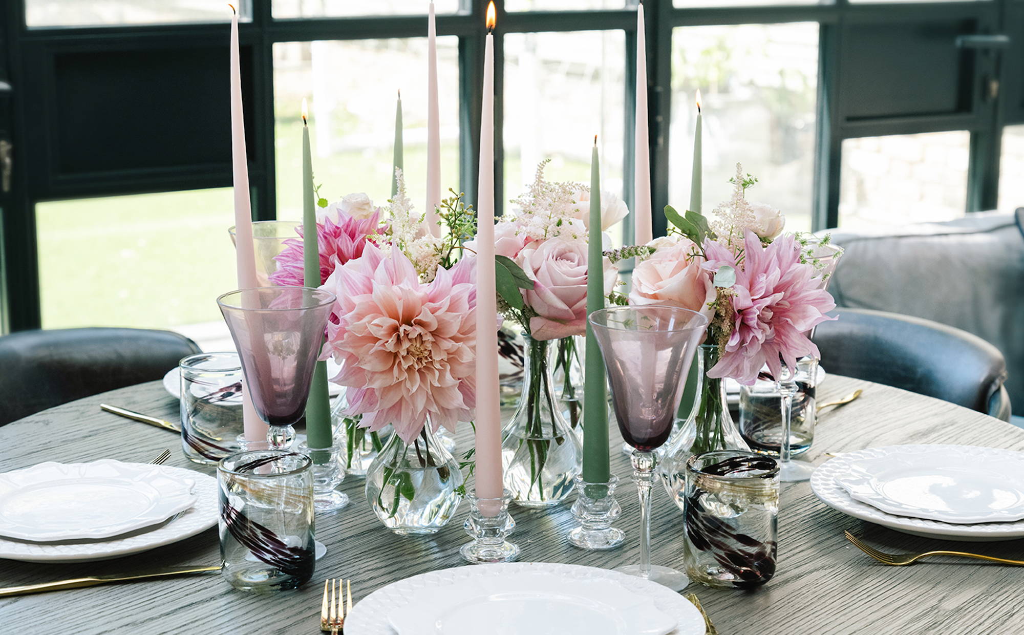 Wild at Heart Summer Bud Vase Tablescape, featuring bud vases with seasonal stems and four tapered candles.