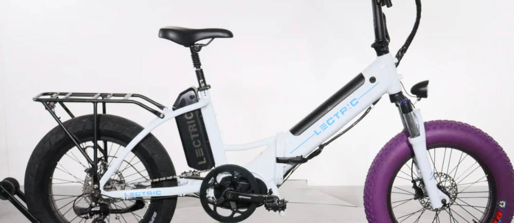 a Lectric XPremium Dual Battery electric bike with a purple front wheel