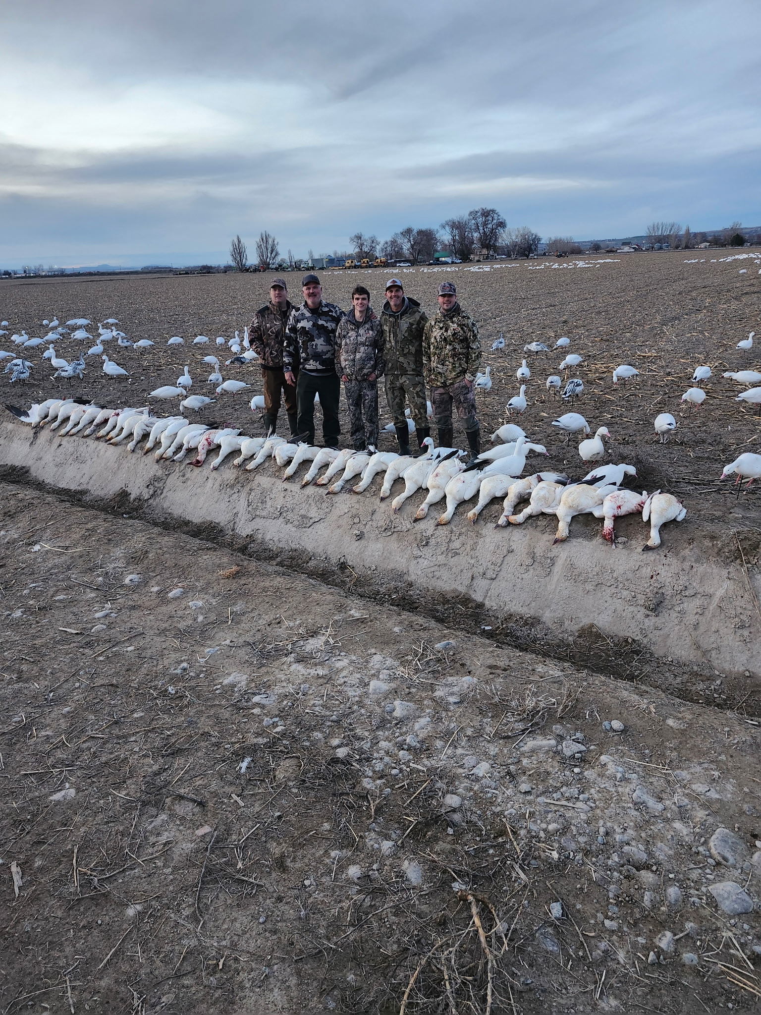 Owyhee County Outfitters group with a morning's snow geese