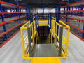 Pallet Racking Supported Mezzanine with Resindek Flooring and Yellow Staircase in Pick Module