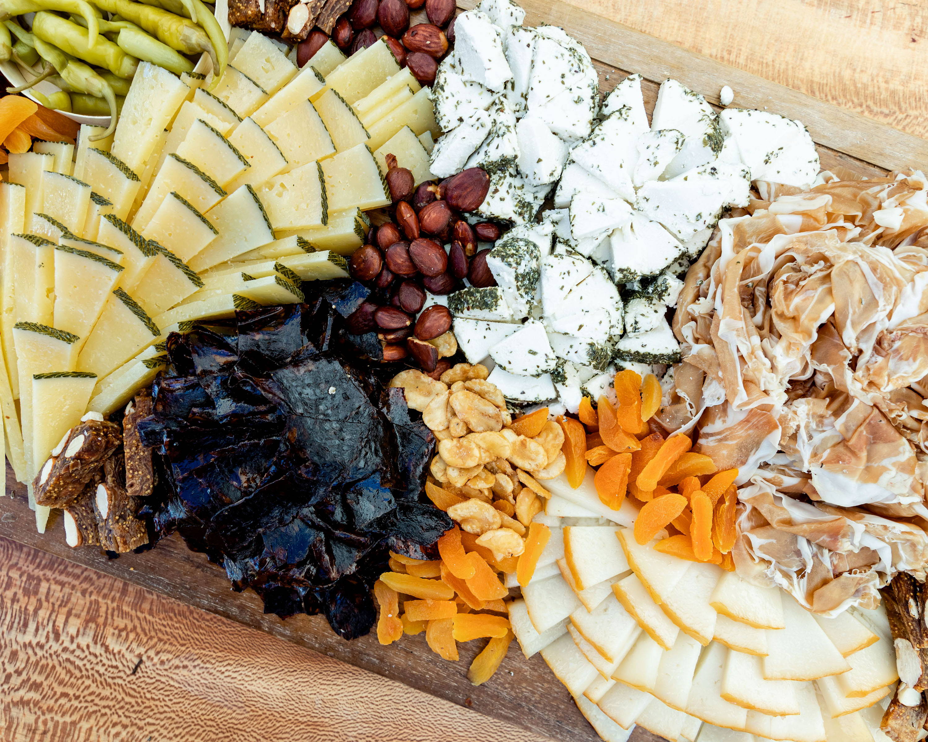 A complete farm-to-table charcuterie board spread