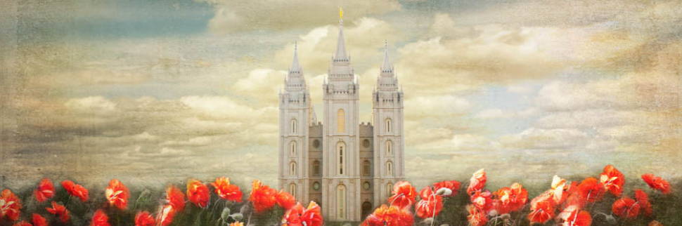 Panoramic picture of the Salt Lake Temple with red flowers in the forefront.