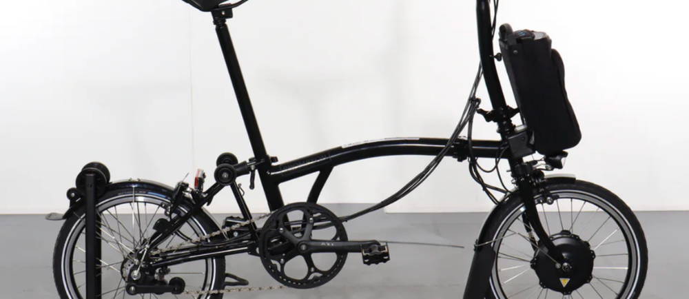 A black Brompton Electric C Line Explore electric folding bike