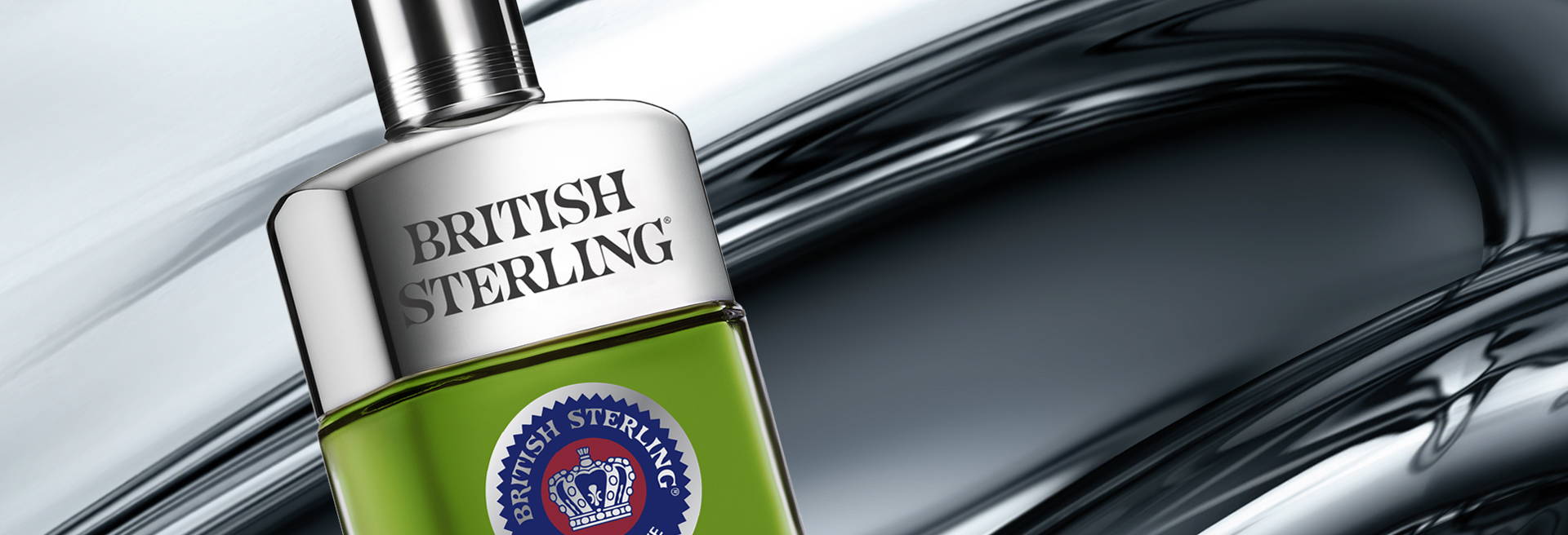 Editorial shot: Bottle of British Sterling cologne on silver chrome background