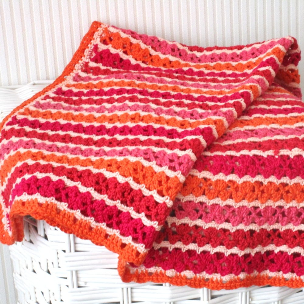 "Simply in red” baby deken