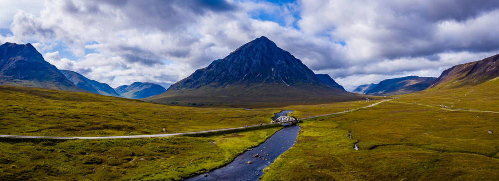 A rock strewn Highland stream winds across Rannoch Moor, under a small road bridge and on down to Glencoe then into the sea.