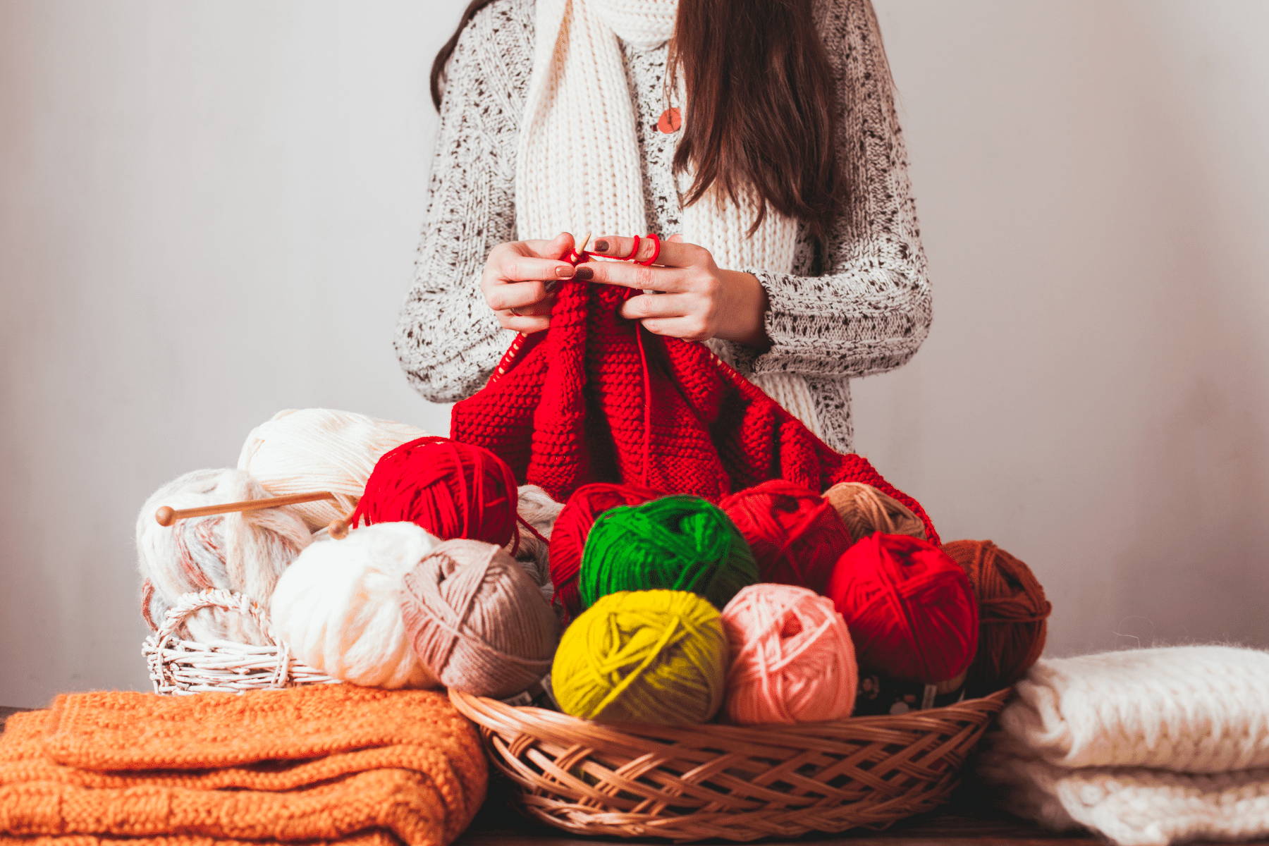 Woman knitting a sweater