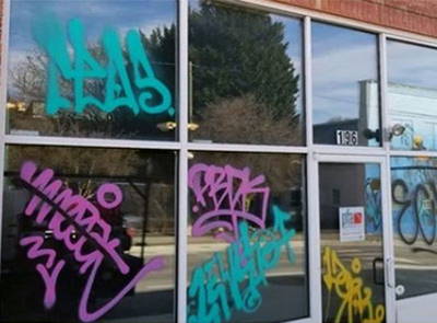 graffiti removal from glass and metal frames