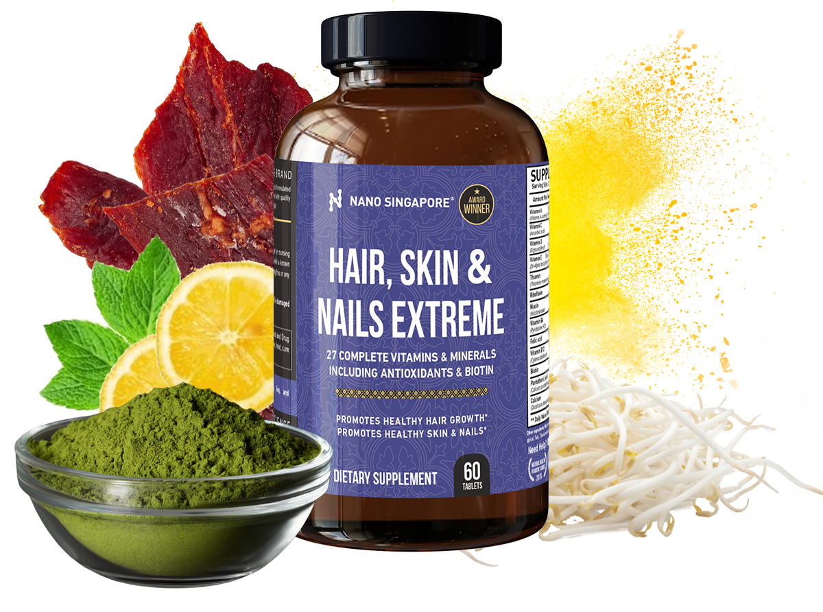 A bottle of our best vitamins for hair growth surrounded by various ingredients