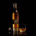 Avion reserva 44 in an open bottle and glass