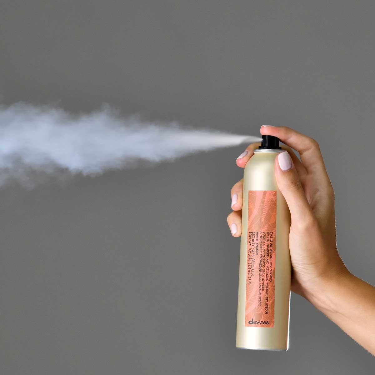 Invisible Dry Shampoo spraying
