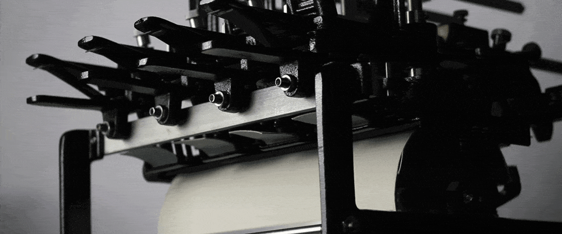 wyzenbeek machine performing rub test