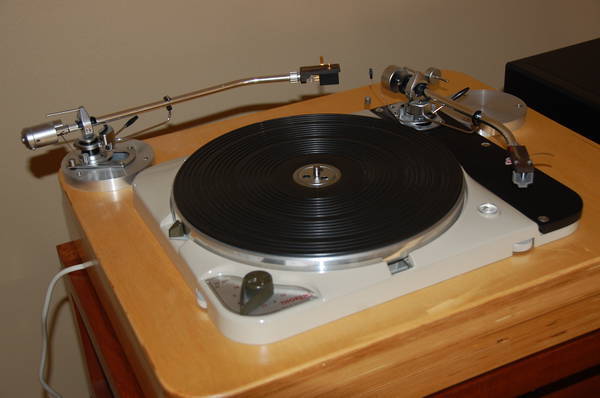 Thorens TD-124 mki TT, SME 3012R tonearm, Soundsmith re-tipped Denon DL-103 cart, multi-layered Baltic birch plinth