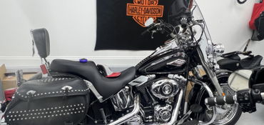 2014 HARLEY-DAVIDSON FLSTC HERITAGE SOFTAIL CLASSIC (VIVID BLACK) motorcycle for rent near Santa Rosa Beach, FL