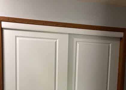 Pewaukee Home's New Look: 7 Manhattan Doors Installed, White Doors with Stained Trim