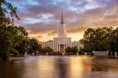 Houston Temple surrounded by flood waters but a beautiful sunrise.