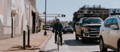 Rider on electric city bike in bike lane