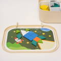 Montessori Twist and Match Puzzle toy featuring realistic images of zebras, lions, elephants, and giraffes.