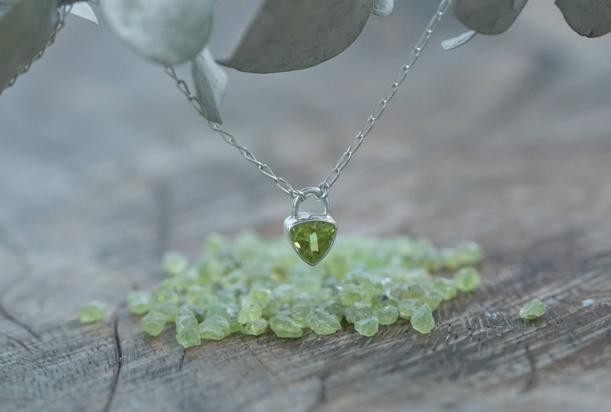 peridot lock necklace in silver