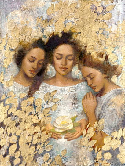 Three young women gathered around 