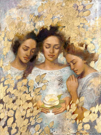 Three young women gathered around 