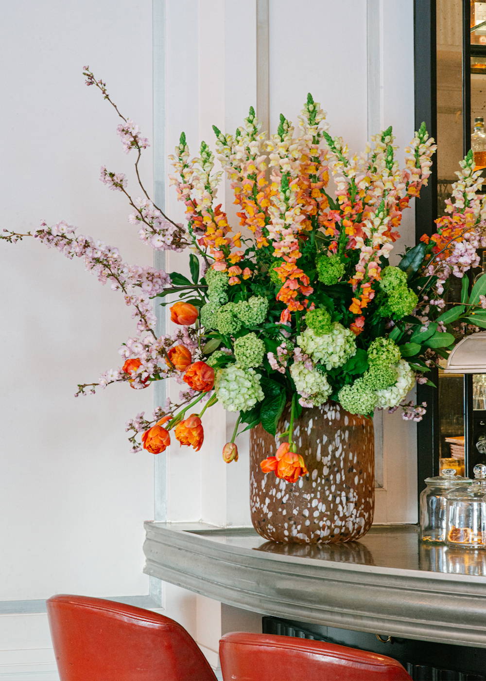 Wild at Heart floral display on the bar at The Marylebone Hotel