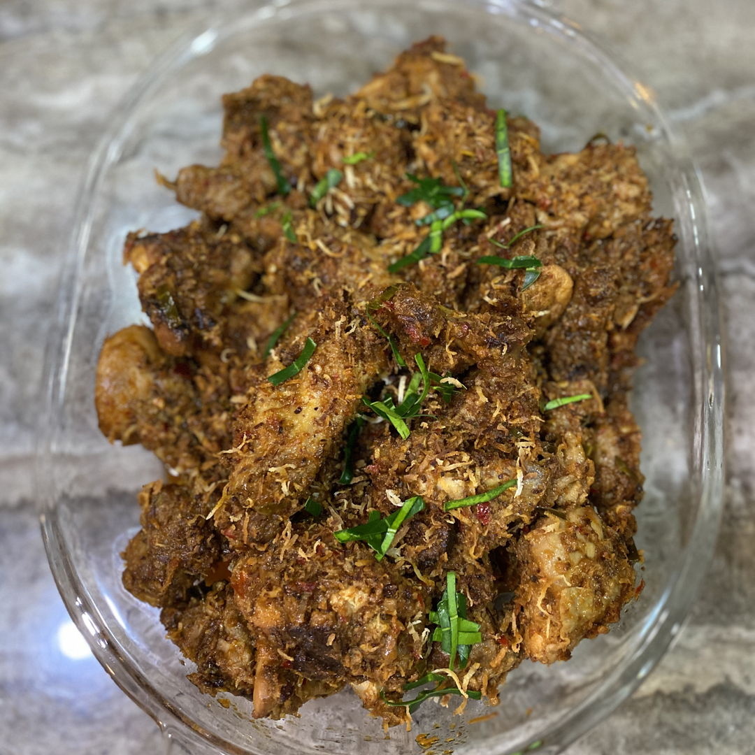 This is a dry chicken rendang.  Used a lot of kerisik which absorbs the sauce.  And used a lot of Daun Limau Purut.