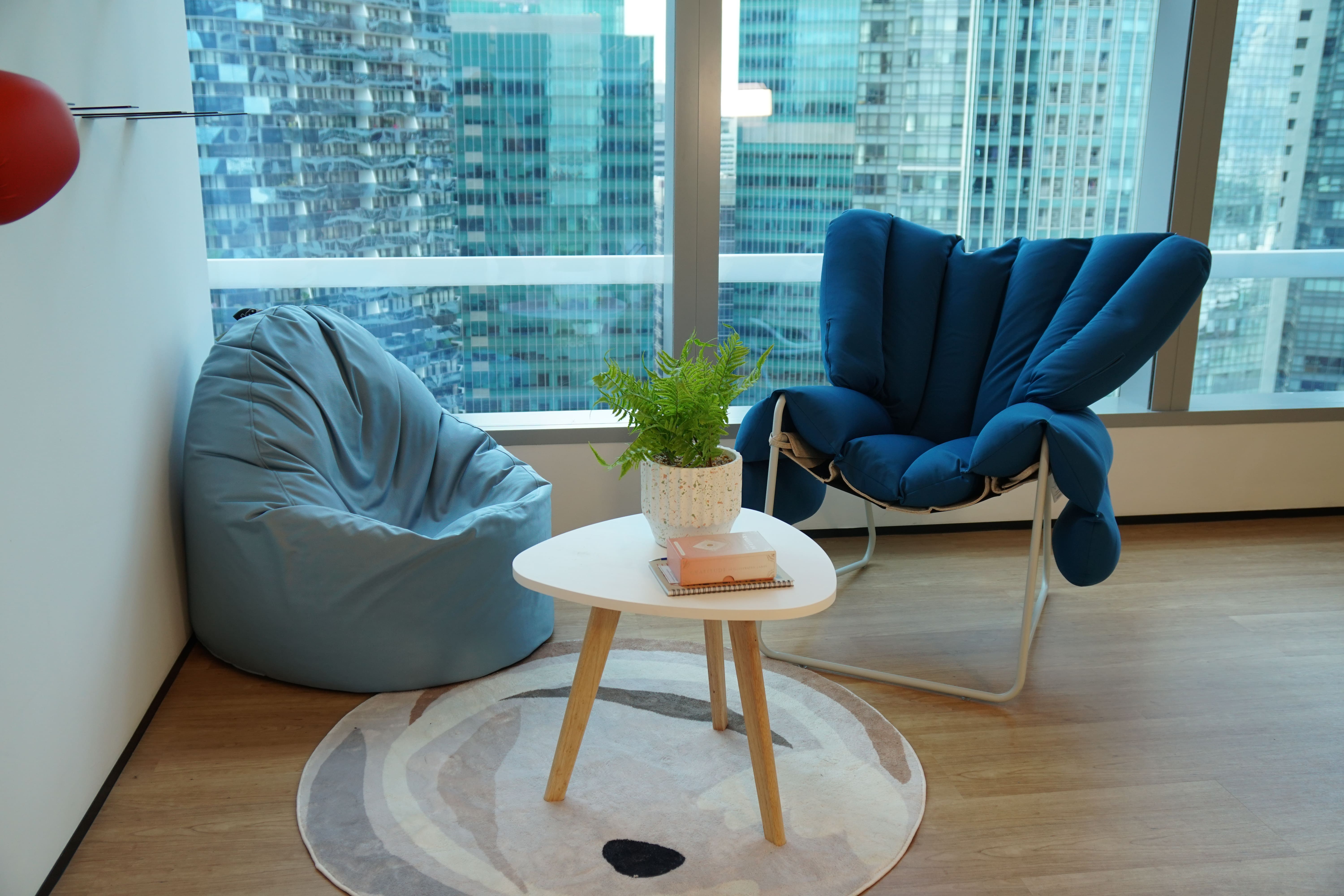 LinkedIn Singapore office wellness corner featuring doob adaptive support bean bag and hugging chair for employee relaxation and collaborative focus.