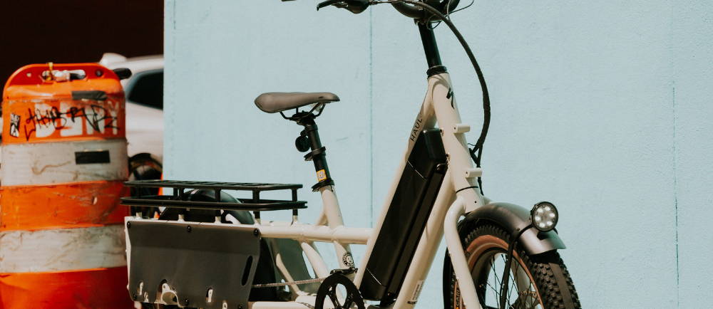 Specialized Globe Haul electric cargo bike next to traffic cone