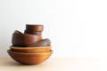stack of restored antique wooden bowls